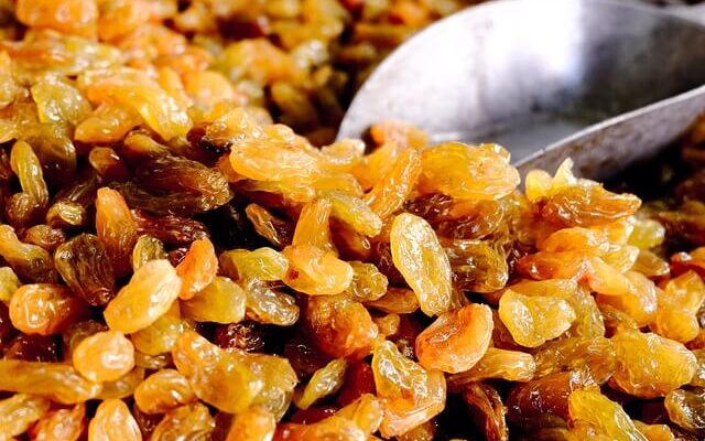 close up picture of golden raisins